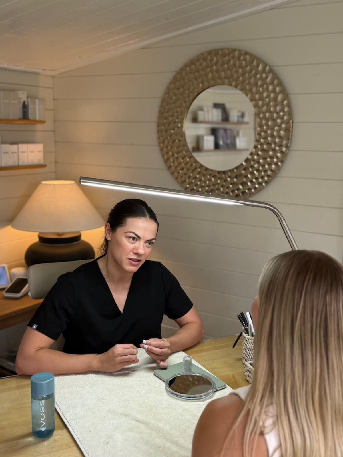 Focused one-to-one skincare consultation at Adorabella